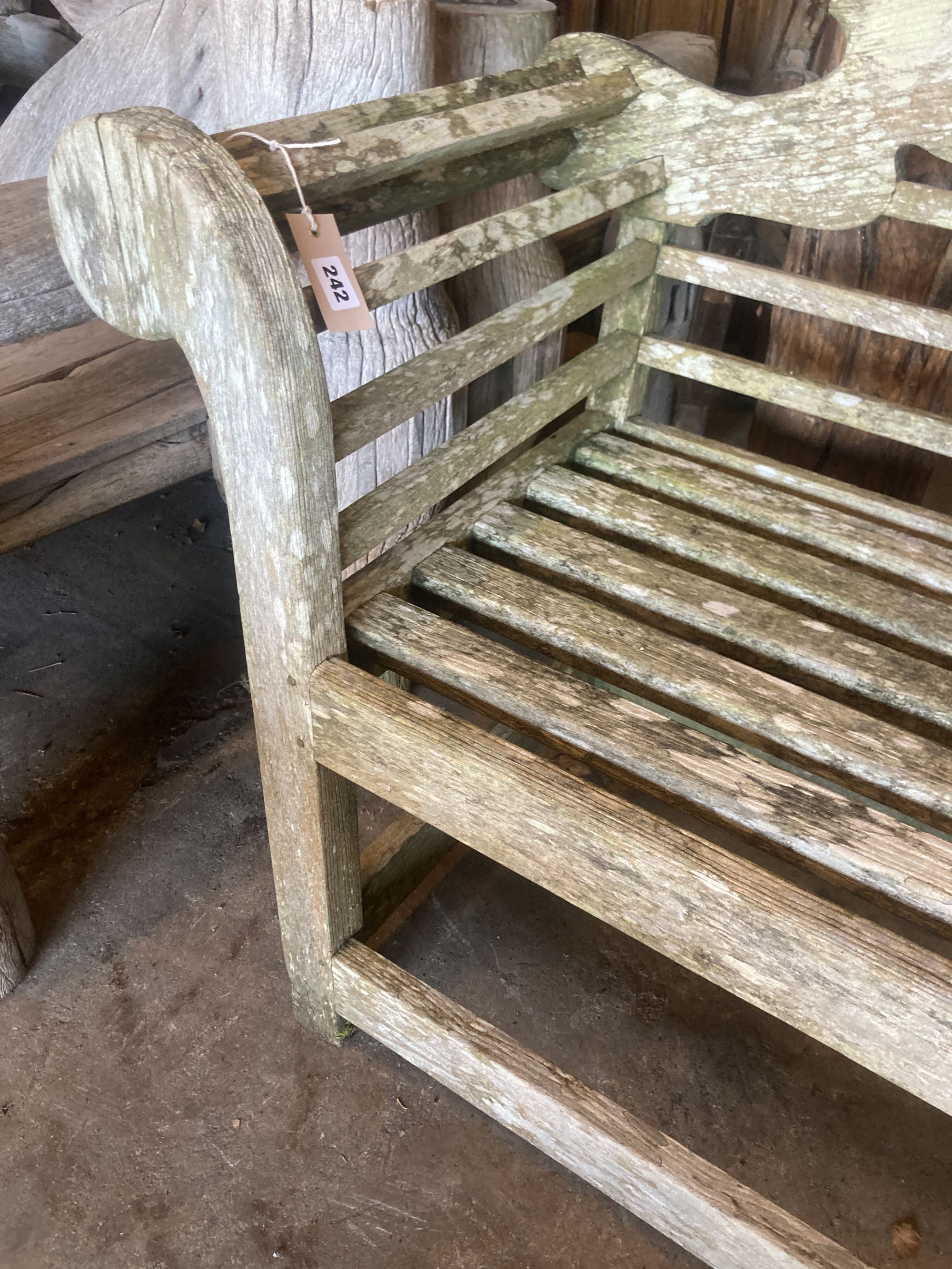 A vintage Lutyens design weathered teak garden bench, width 196cm depth 50cm height 106cm